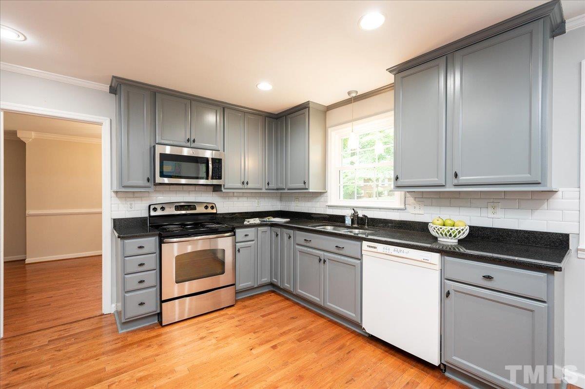 4420 Woodbury Drive Raleigh, NC 27612 - Photo 9 of 22