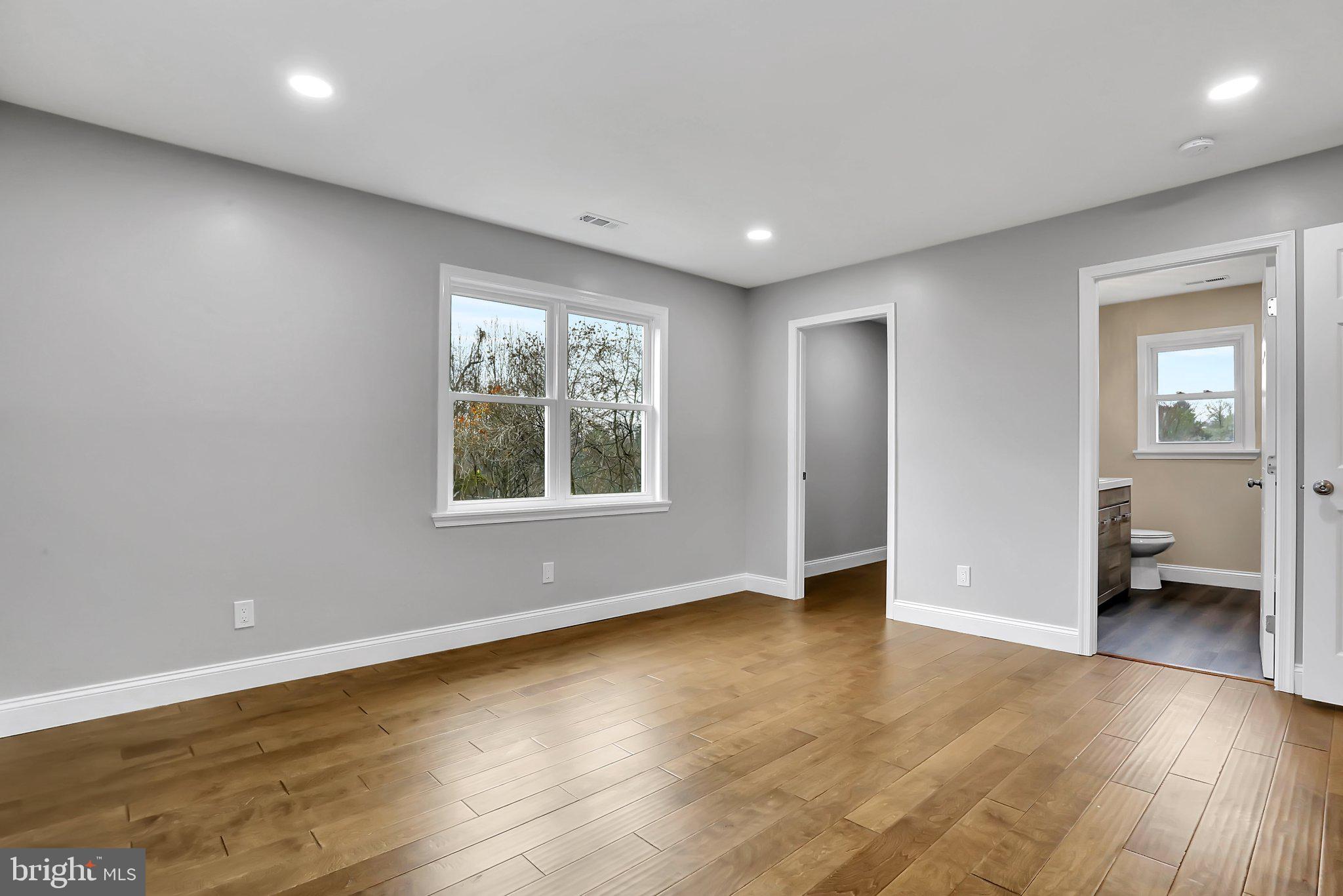 8635 Chestnut Grove Road Frederick, MD 21701 - Photo 10 of 34 Spacious Primary Bedroom with En-Suite Bathroom