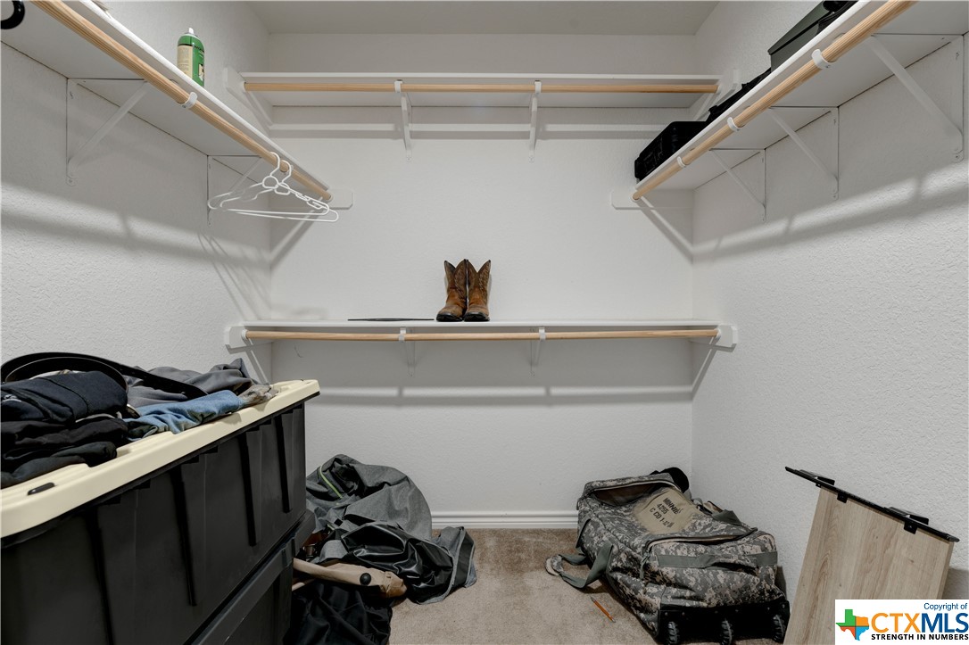 2808 Montague County Drive Killeen, TX 76549 - Photo 6 of 7 a close view of shoes stand and cabinets