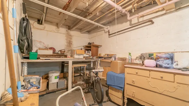 a view of a kitchen with furniture and breakfast area