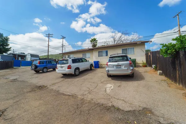 an aerial view of a house with outdoor space