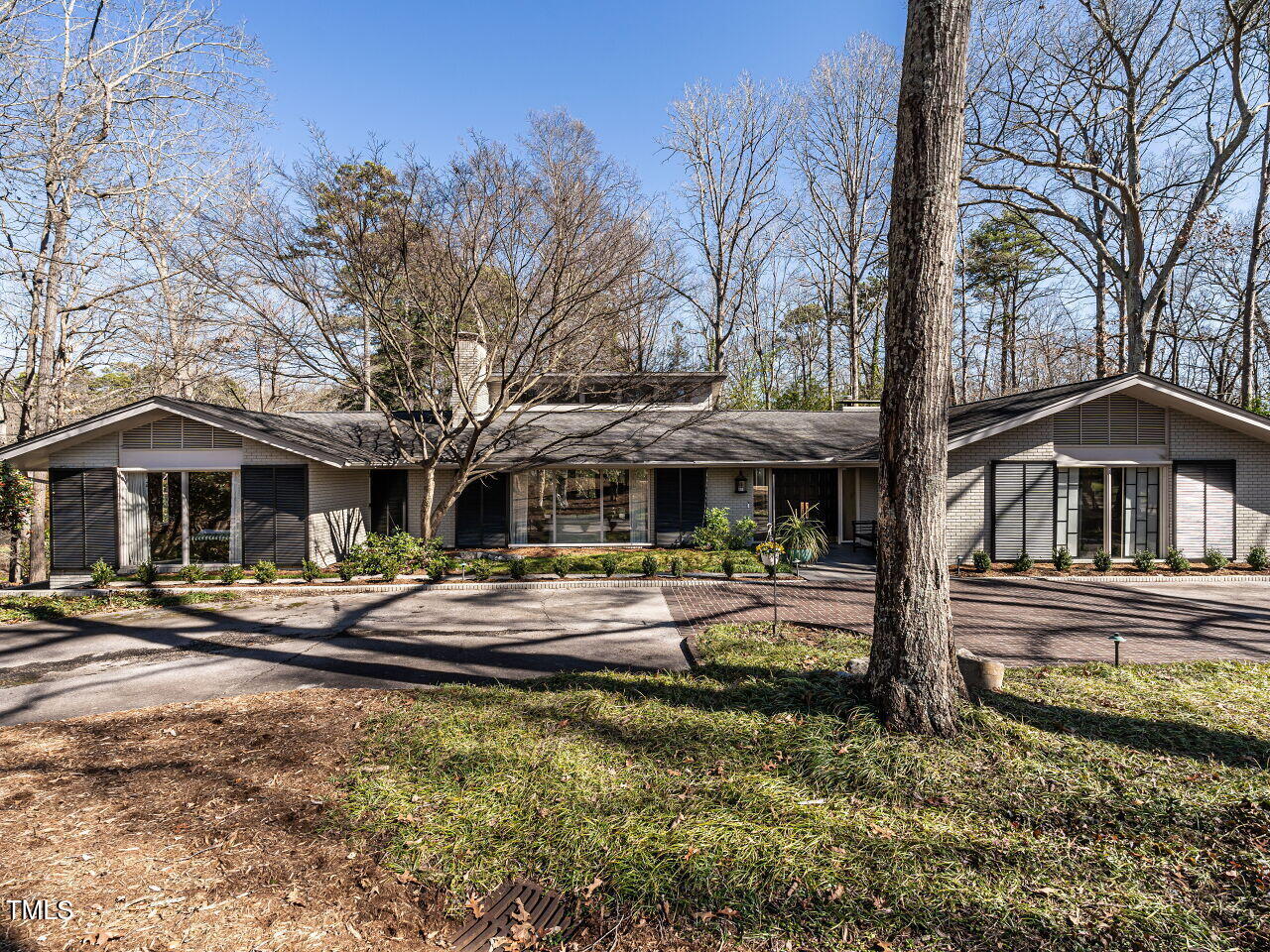 3206 Sussex Road Raleigh, NC 27612 - Photo 1 of 51 a front view of a house with garden