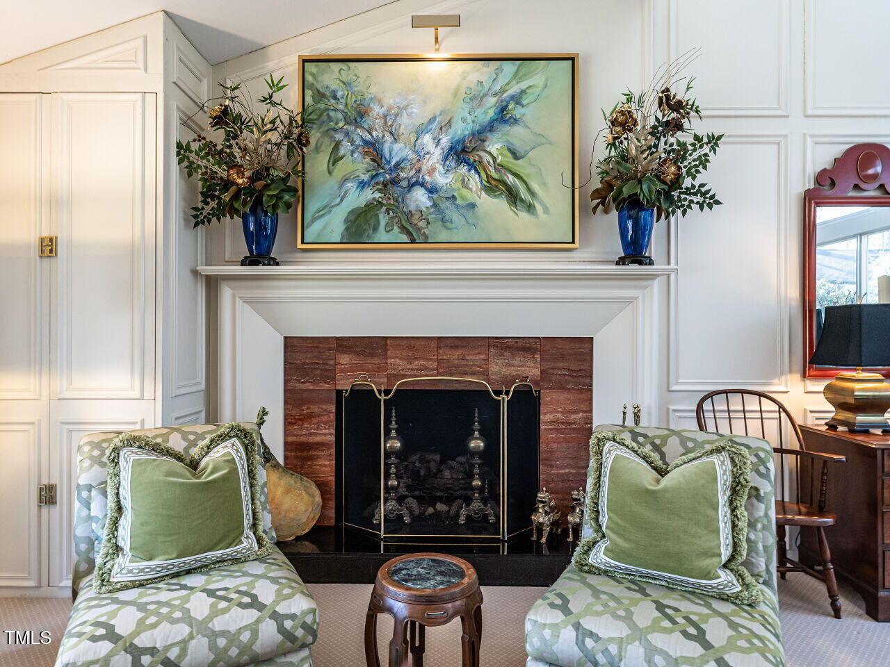 3206 Sussex Road Raleigh, NC 27612 - Photo 14 of 51 a living room with furniture and a fireplace
