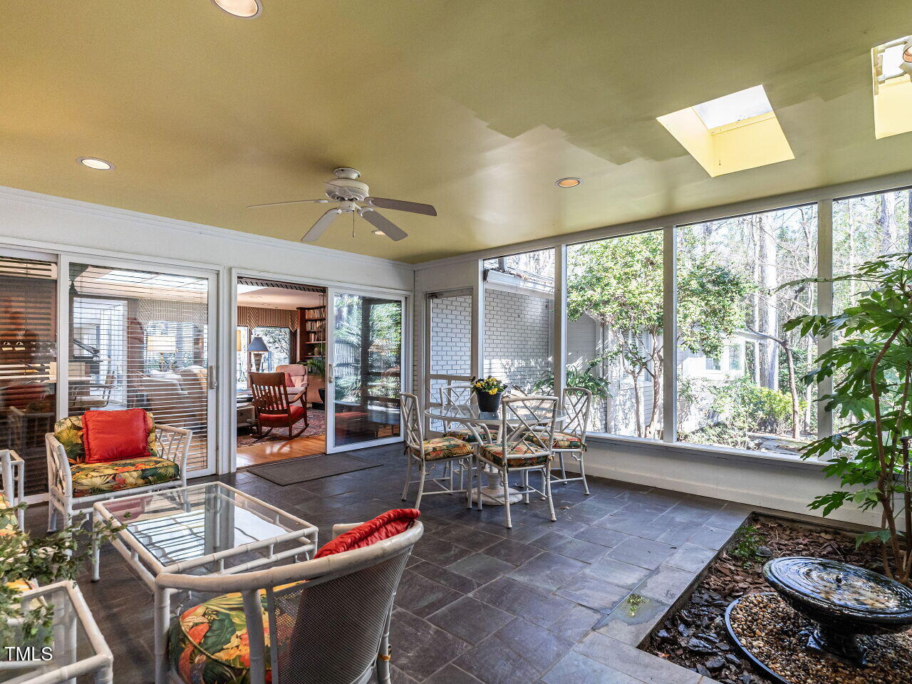 3206 Sussex Road Raleigh, NC 27612 - Photo 39 of 51 a living room with furniture and floor to ceiling windows