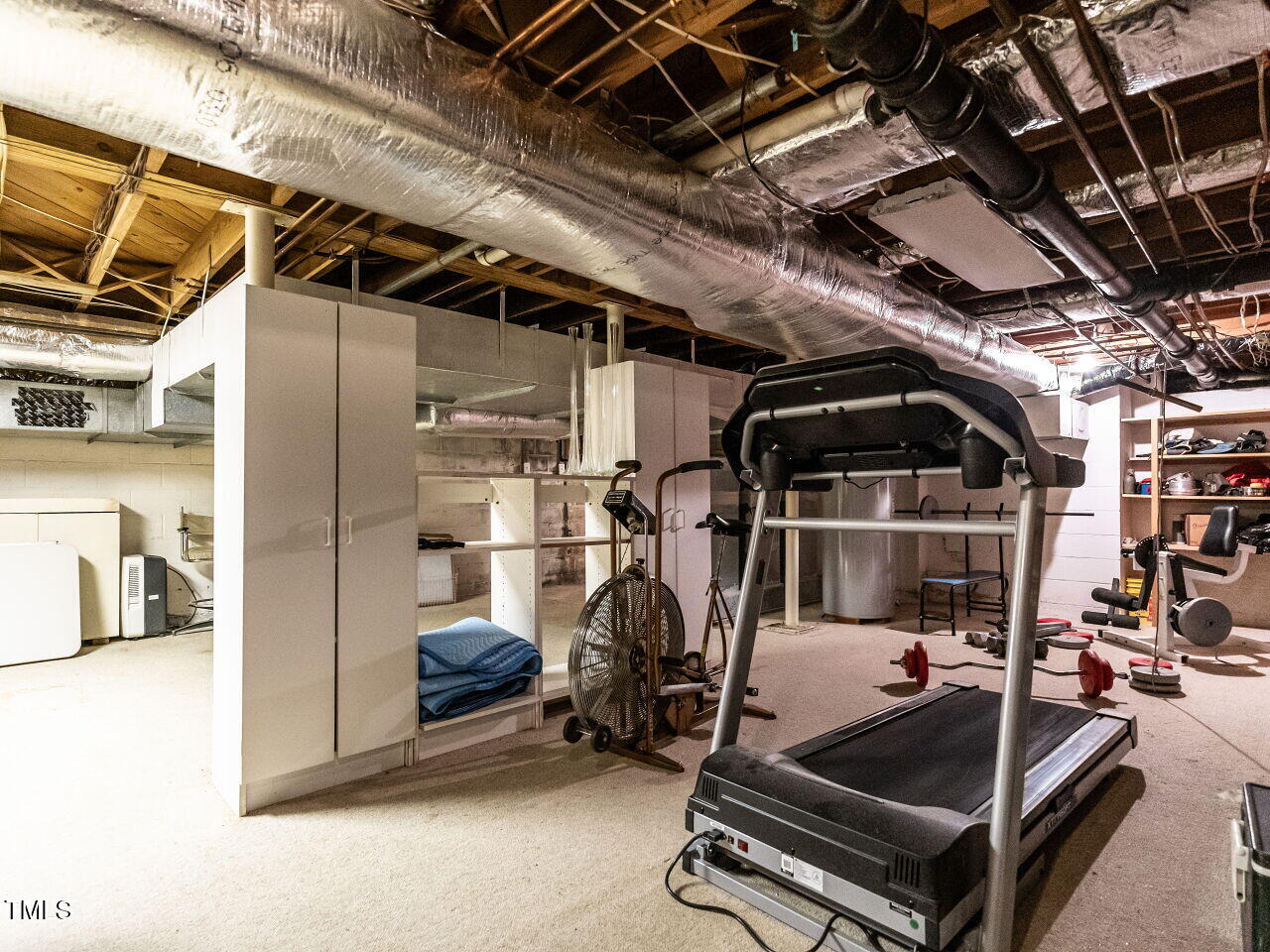3206 Sussex Road Raleigh, NC 27612 - Photo 40 of 51 a room with gym equipment