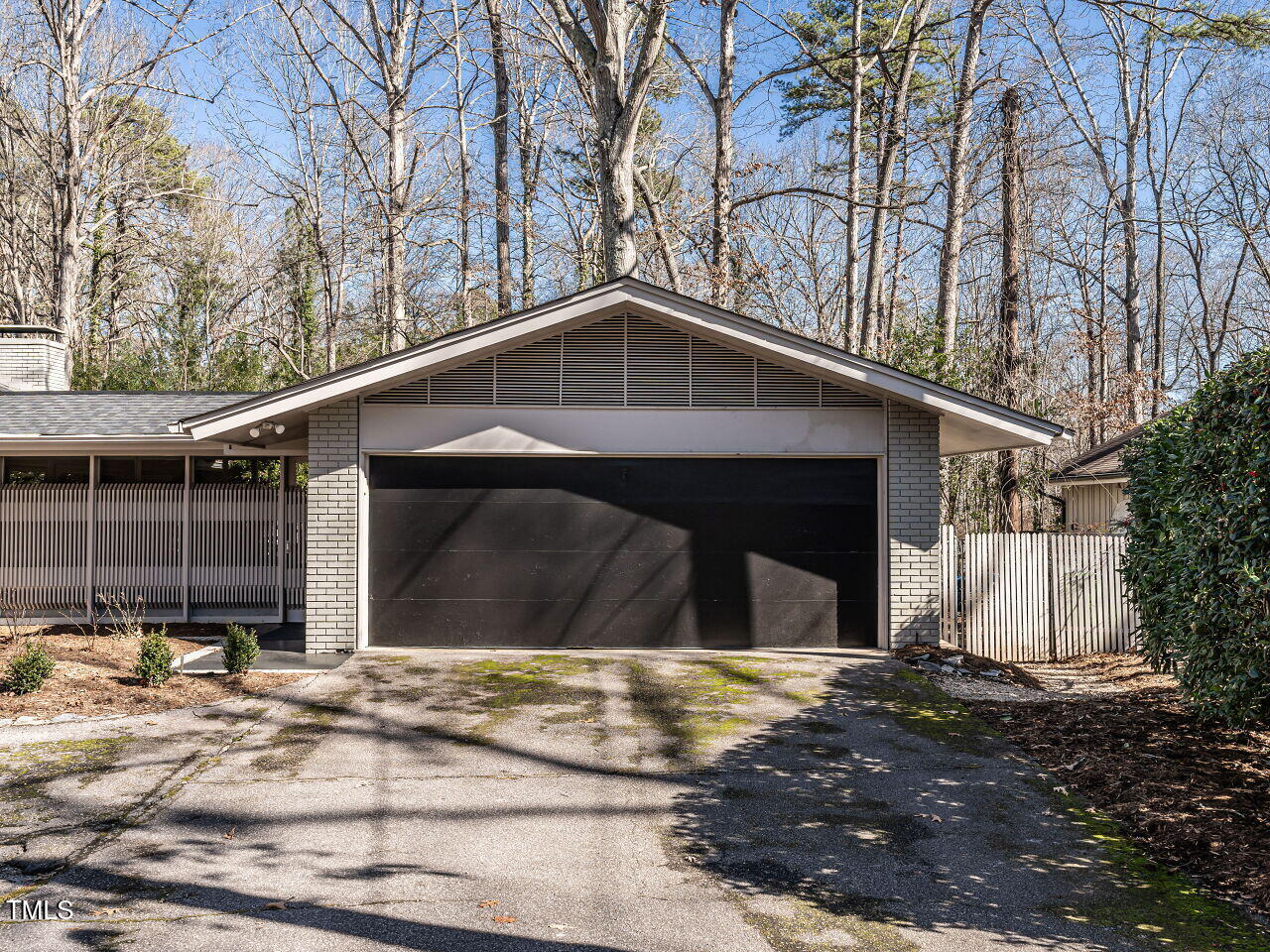 3206 Sussex Road Raleigh, NC 27612 - Photo 49 of 51 a view of a small house with a yard