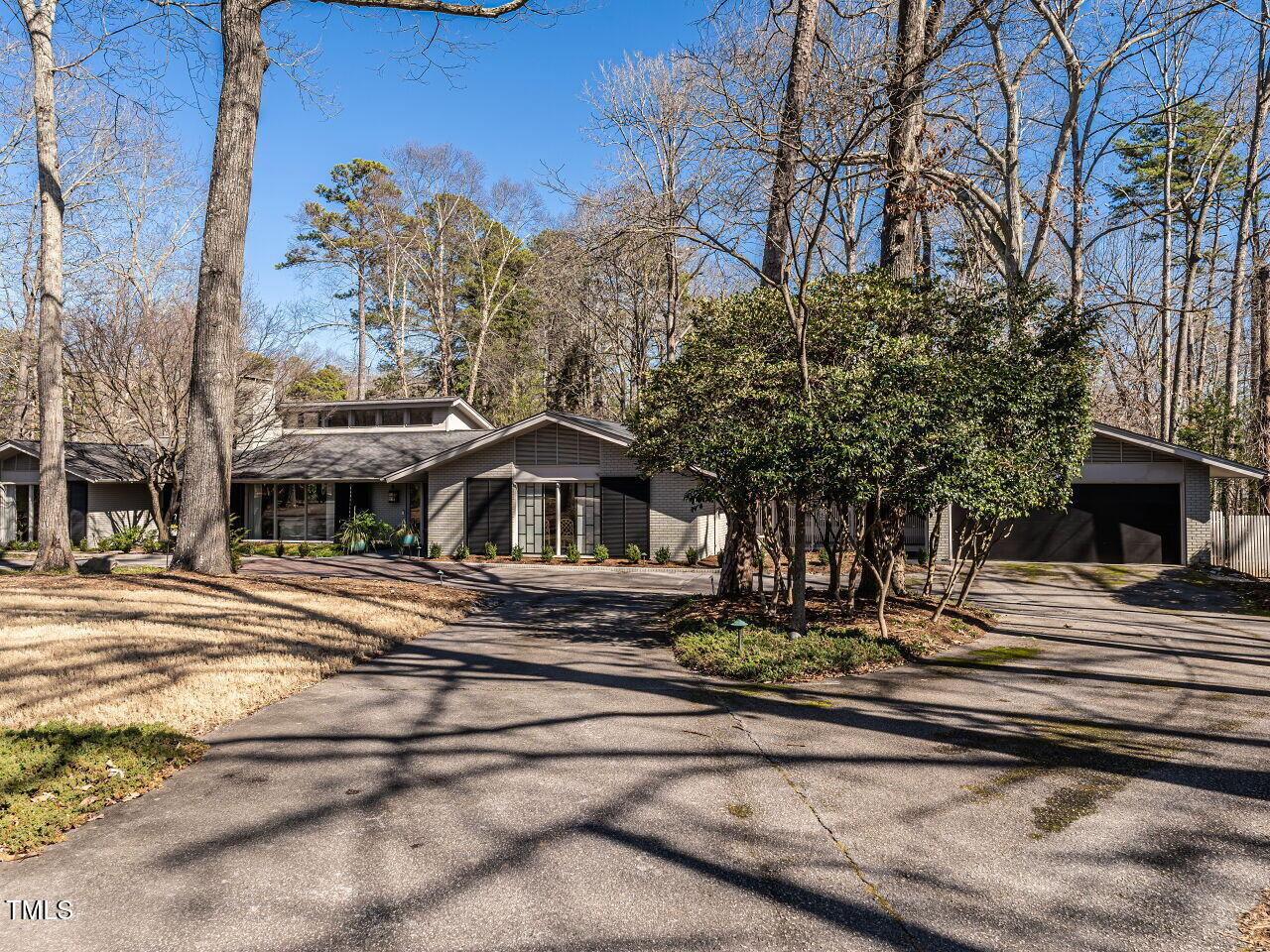 3206 Sussex Road Raleigh, NC 27612 - Photo 50 of 51 a front view of a house with a yard