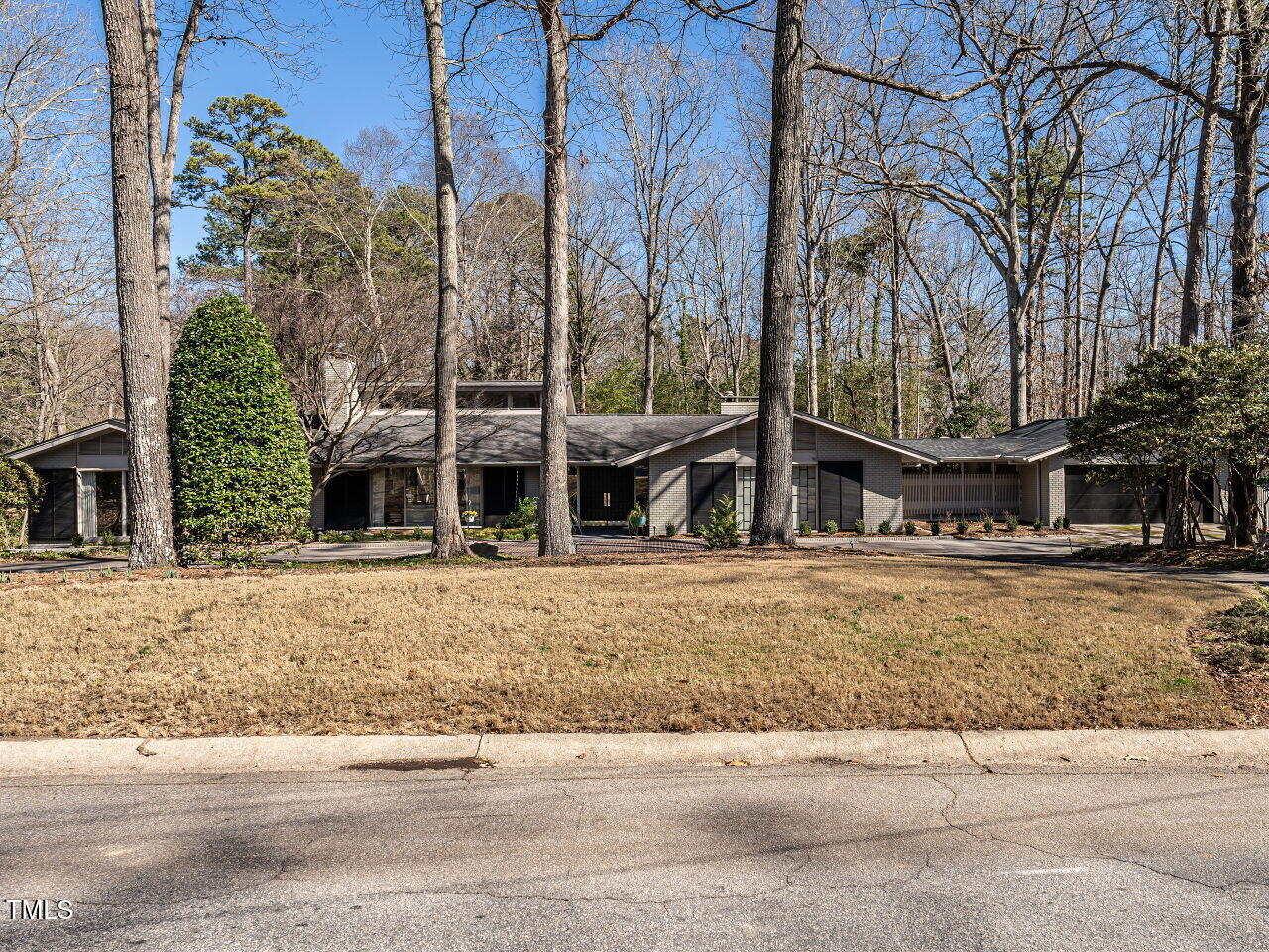 3206 Sussex Road Raleigh, NC 27612 - Photo 51 of 51 front view of a house with a yard