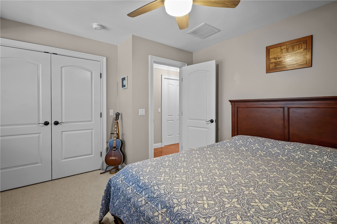 78 Conservatory Way, Unit 78 Saunderstown, RI 02874 - Photo 24 of 34 Guest bedroom with spacious closet