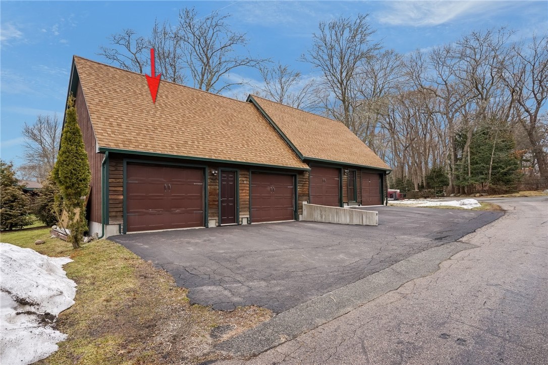 78 Conservatory Way, Unit 78 Saunderstown, RI 02874 - Photo 27 of 34 Garage with walk up loft