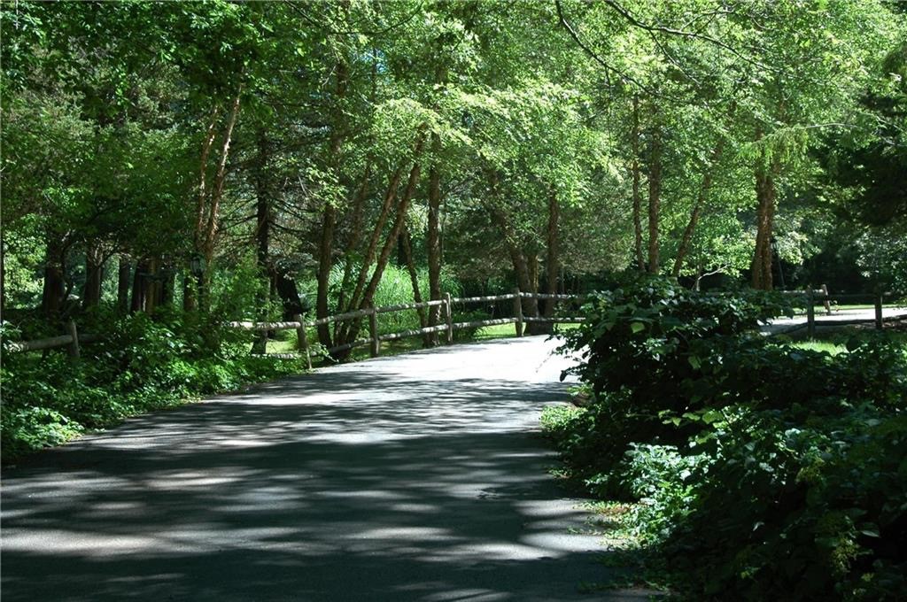 78 Conservatory Way, Unit 78 Saunderstown, RI 02874 - Photo 31 of 34 So lush in summer!
