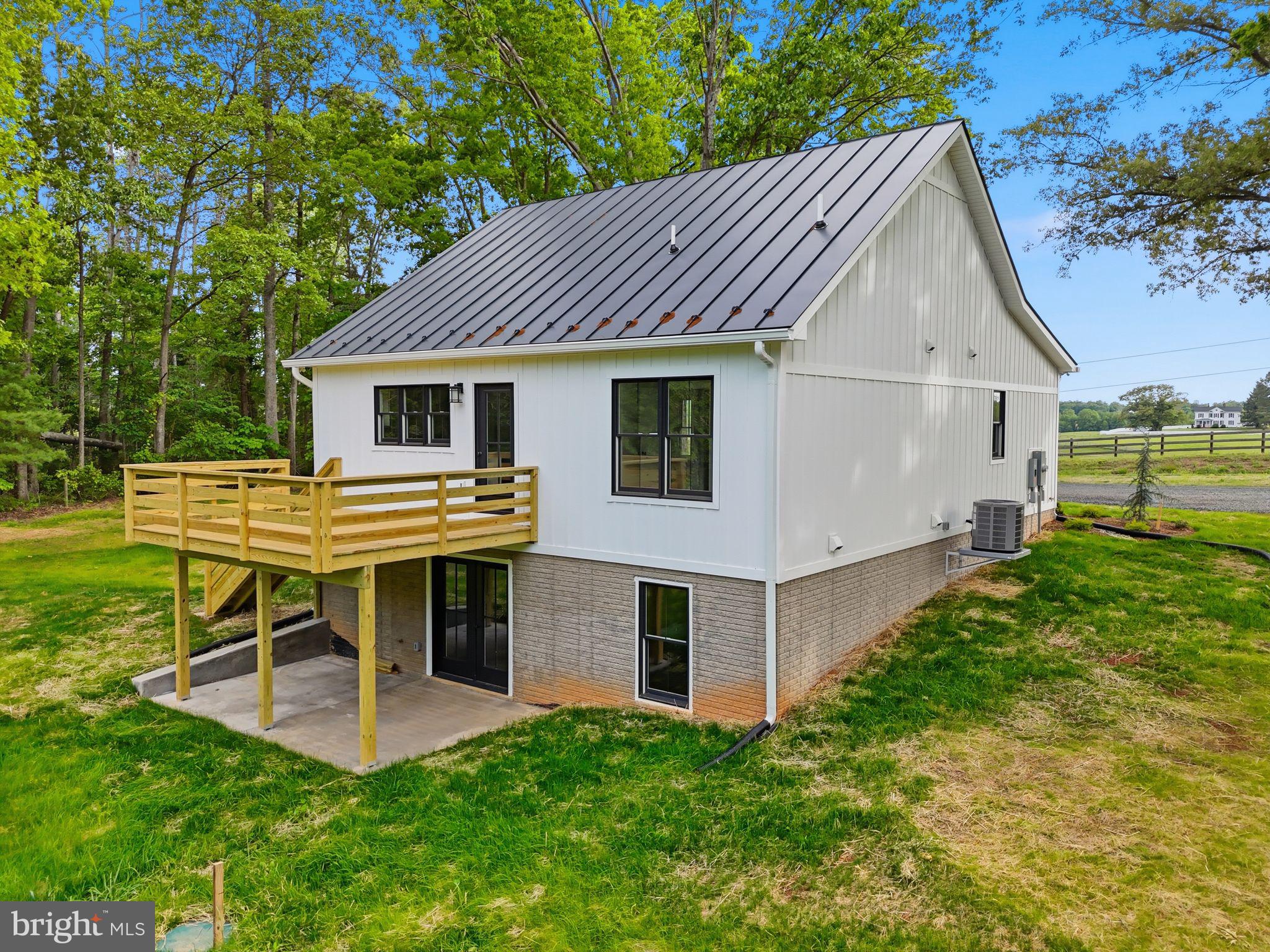 1548 James City Road Reva, VA 22735 - Photo 48 of 48 a view of a house with a yard porch and sitting area