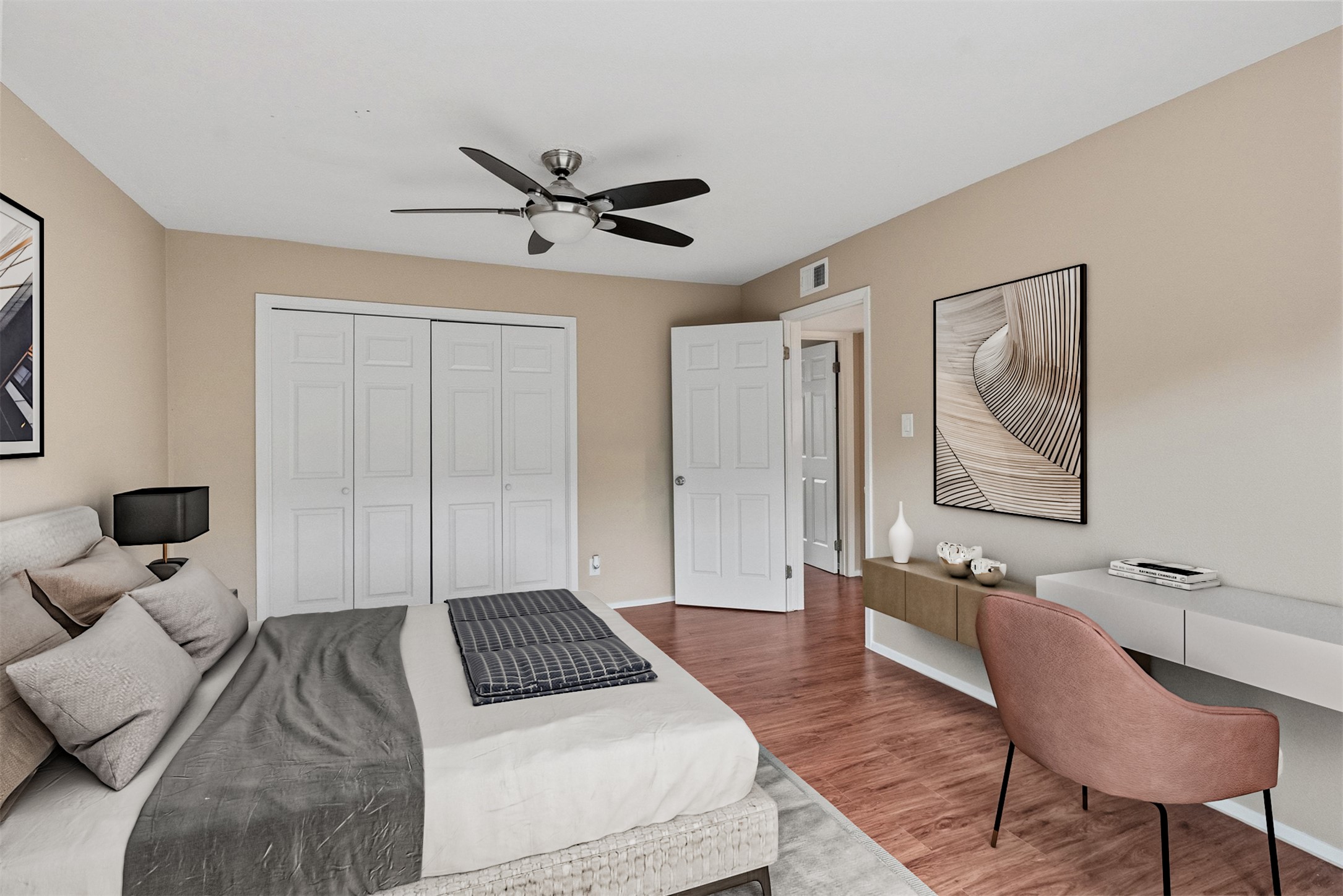 702 Castle Ridge Road, Unit C Austin, TX 78746 - Photo 7 of 36 . Upstairs, two spacious bedrooms provide comfortable accommodations. One bedroom includes a walk-in closet, while the second features access to a private balcony.