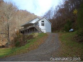 296 Long Branch Road Canton, NC 28716 - Photo 1 of 12 a view of a house with a yard