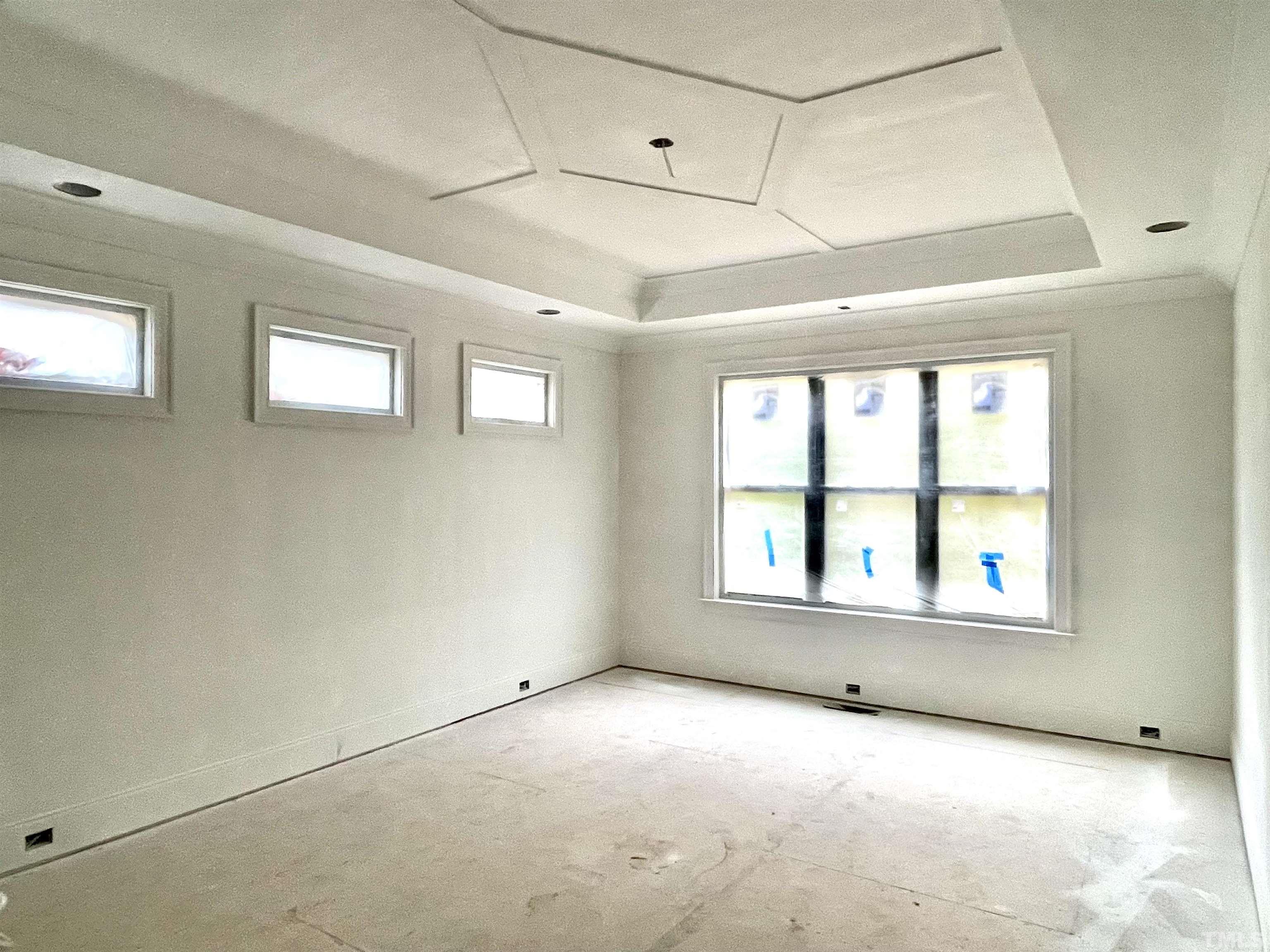 3820 Noremac Drive Raleigh, NC 27612 - Photo 2 of 46 an empty room with a window