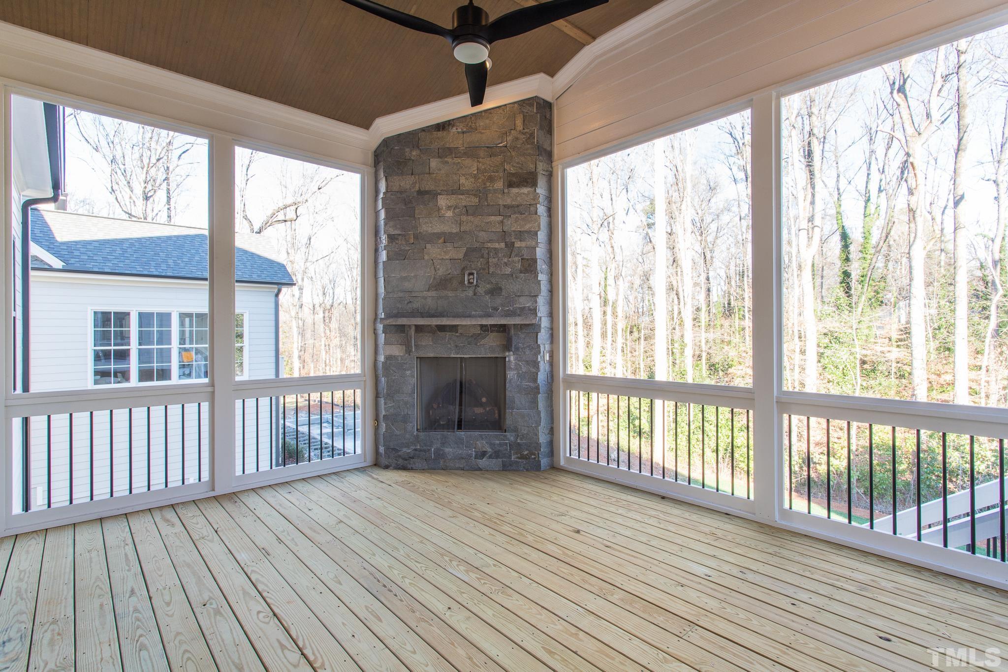 3820 Noremac Drive Raleigh, NC 27612 - Photo 12 of 46 a view of an empty room with wooden floor and a window