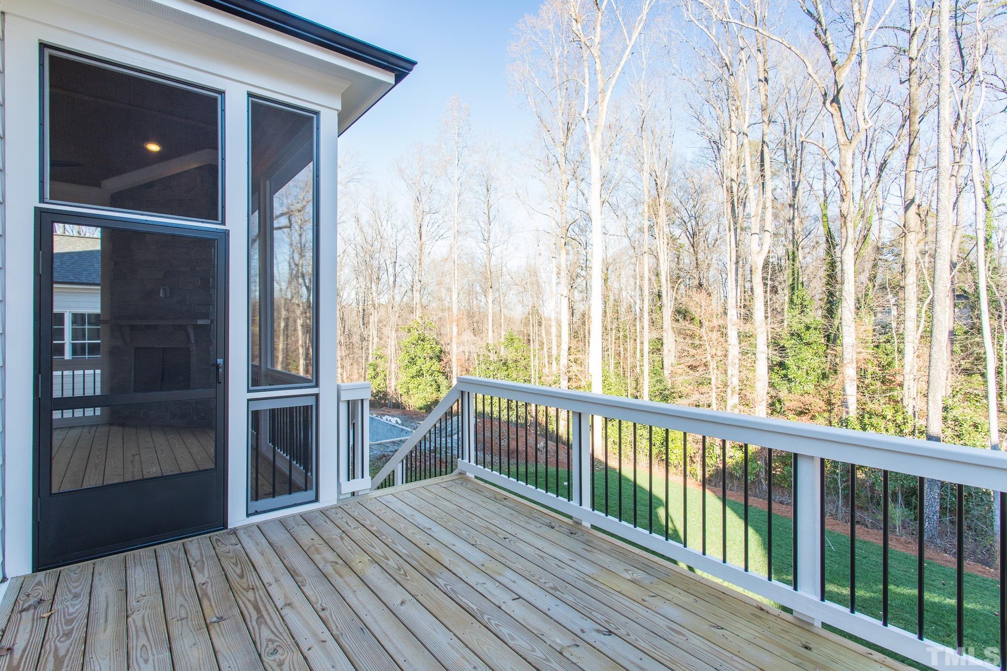 3820 Noremac Drive Raleigh, NC 27612 - Photo 13 of 46 a view of a balcony with wooden floor and iron gate
