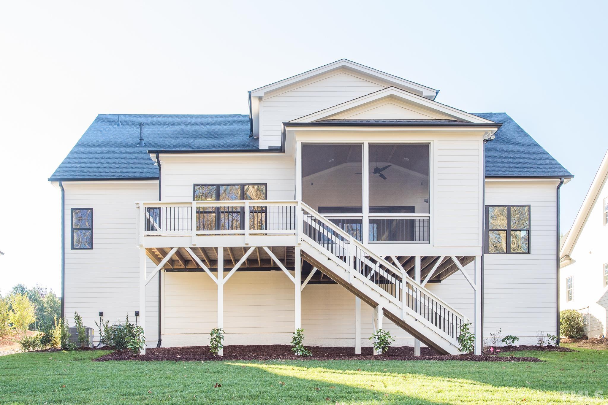 3820 Noremac Drive Raleigh, NC 27612 - Photo 15 of 46 a front view of a house with a yard