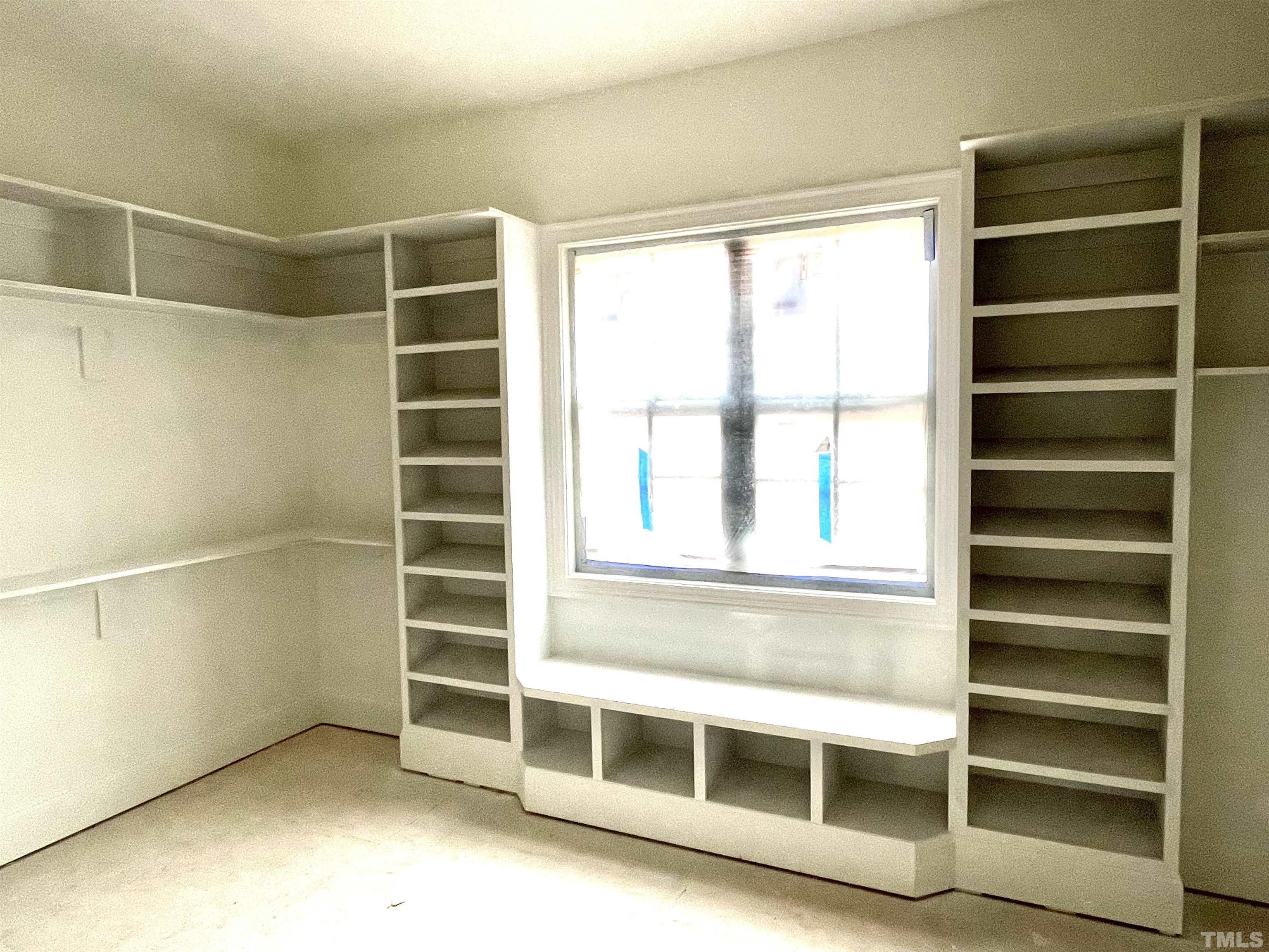 3820 Noremac Drive Raleigh, NC 27612 - Photo 3 of 46 a view of walk in closet with empty racks
