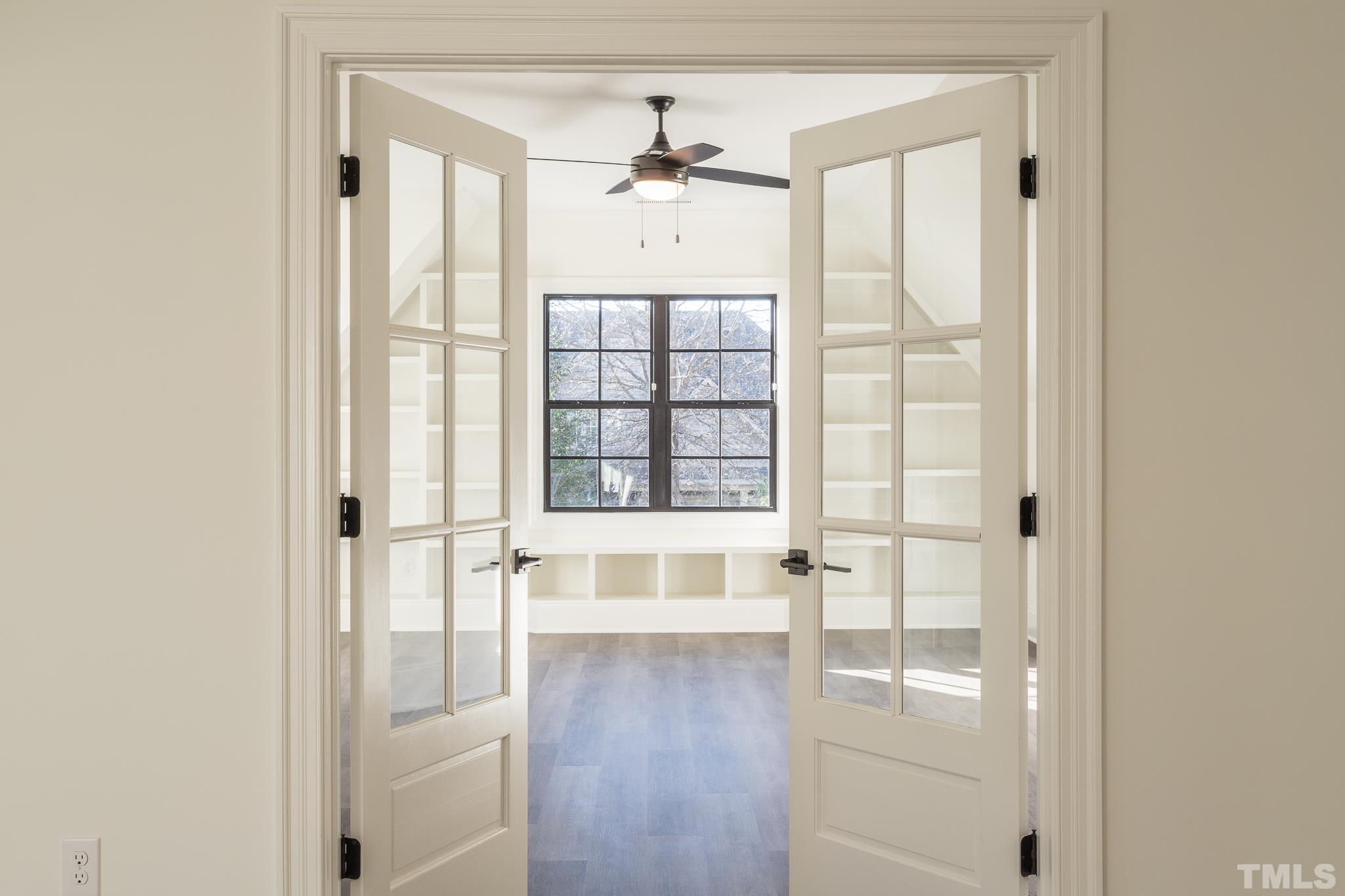3820 Noremac Drive Raleigh, NC 27612 - Photo 31 of 46 a view of wooden floor and windows in a room
