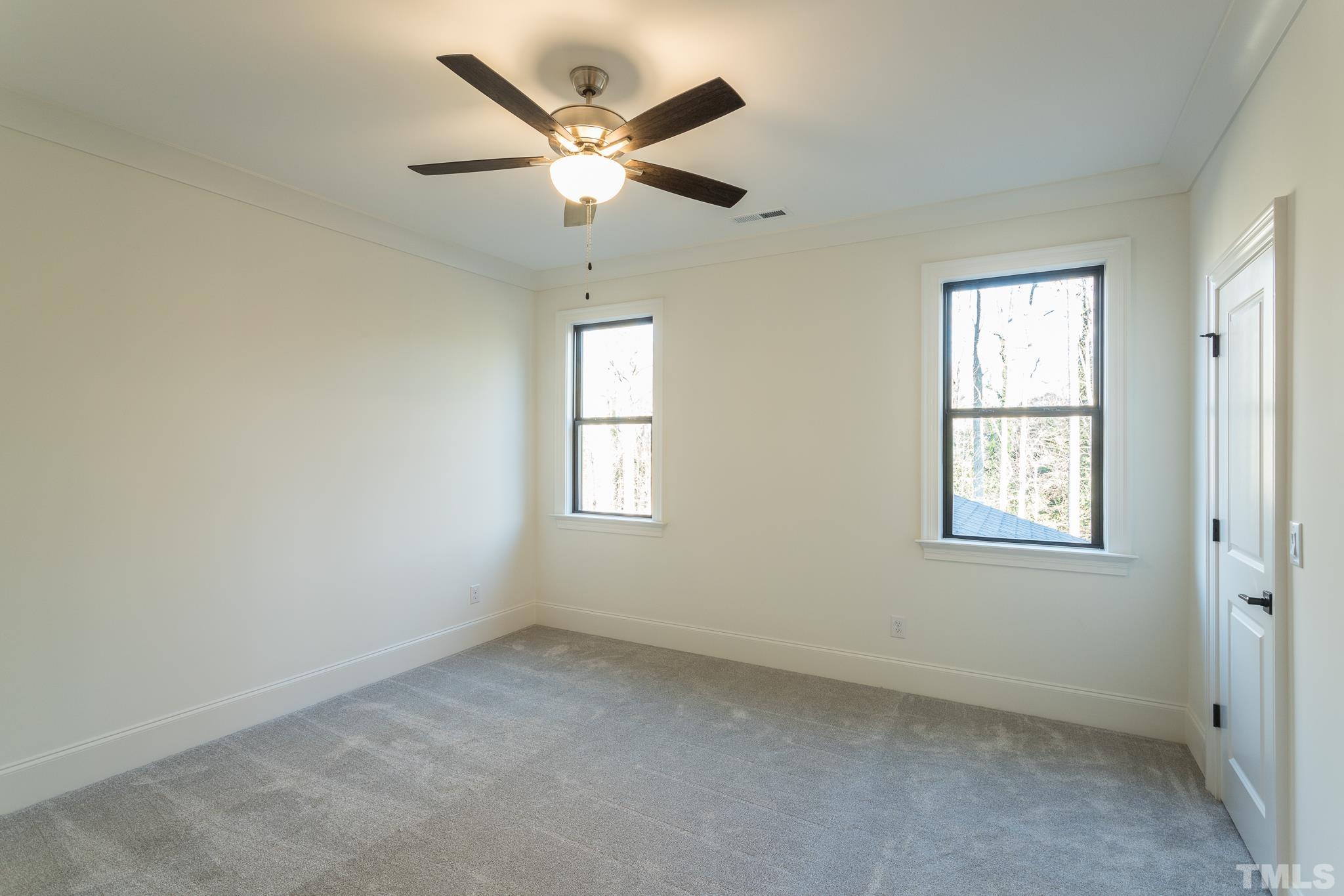 3820 Noremac Drive Raleigh, NC 27612 - Photo 42 of 46 an empty room with a window