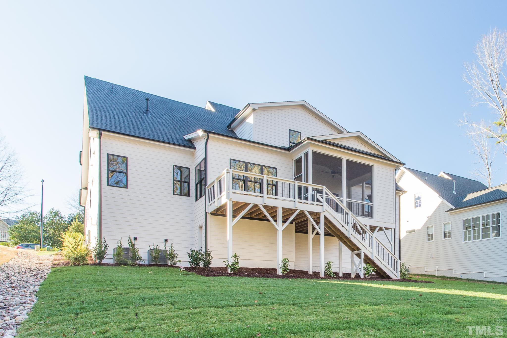 3820 Noremac Drive Raleigh, NC 27612 - Photo 46 of 46 a view of a house with a yard