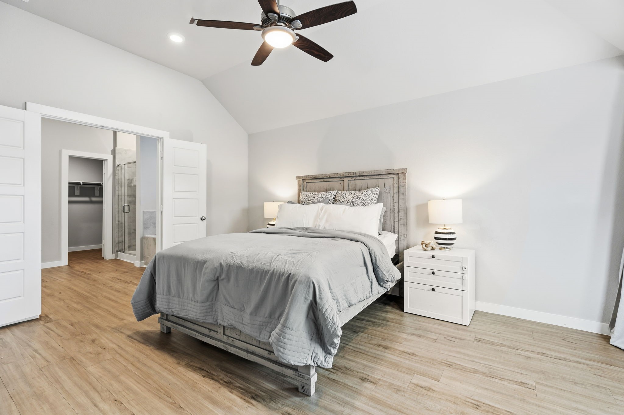14914 Big Bend Ranch Drive Cypress, TX 77433 - Photo 17 of 49 a bedroom with a bed and cabinet