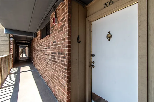 a kitchen with stainless steel appliances granite countertop a refrigerator stove and sink