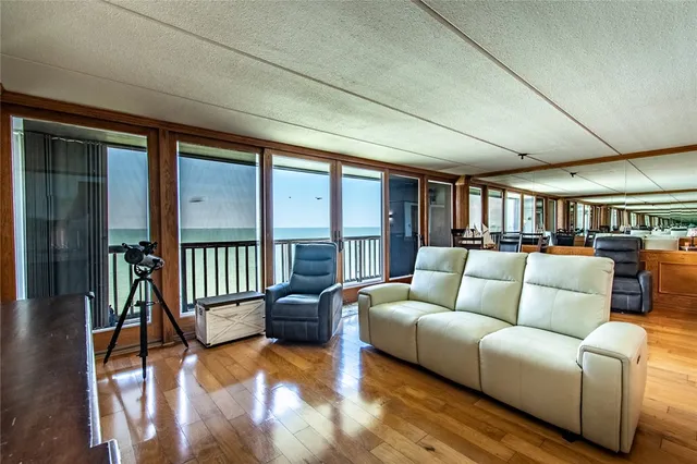 a living room with furniture and a view of living room