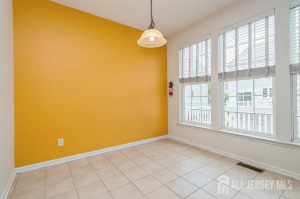 a view of a room with windows