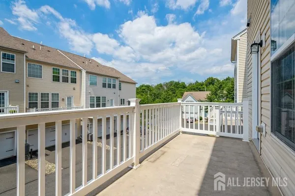 a view of a brick building from a balcony