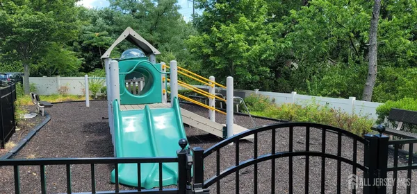a view of a wooden house with a outdoor space