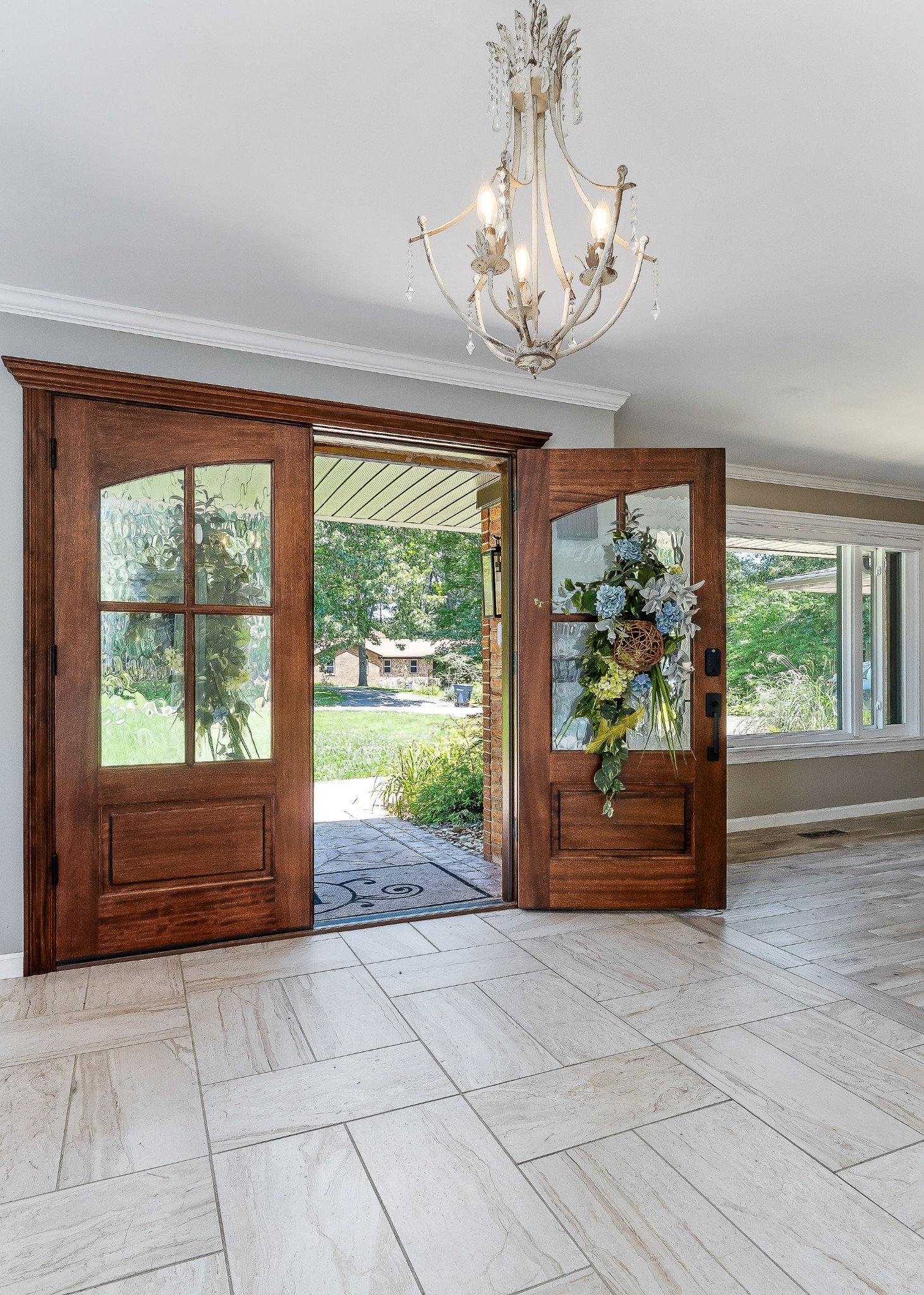 727 Timber Lane Cookeville, TN 38501 - Photo 2 of 68 a view of an empty room with a window and chandelier