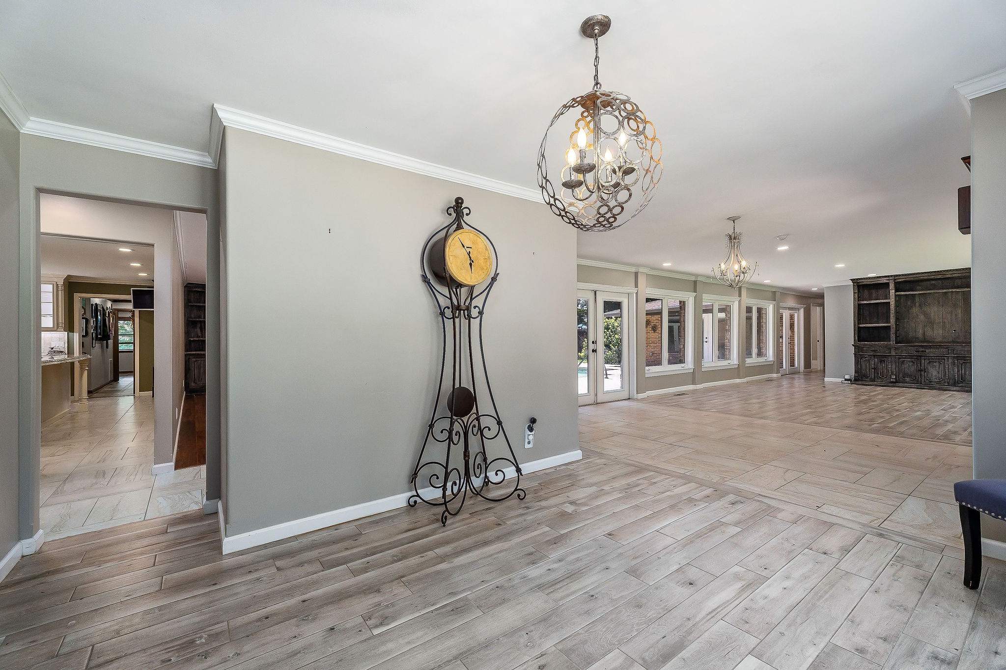 727 Timber Lane Cookeville, TN 38501 - Photo 25 of 68 a view of a hallway with wooden floor and a chandelier