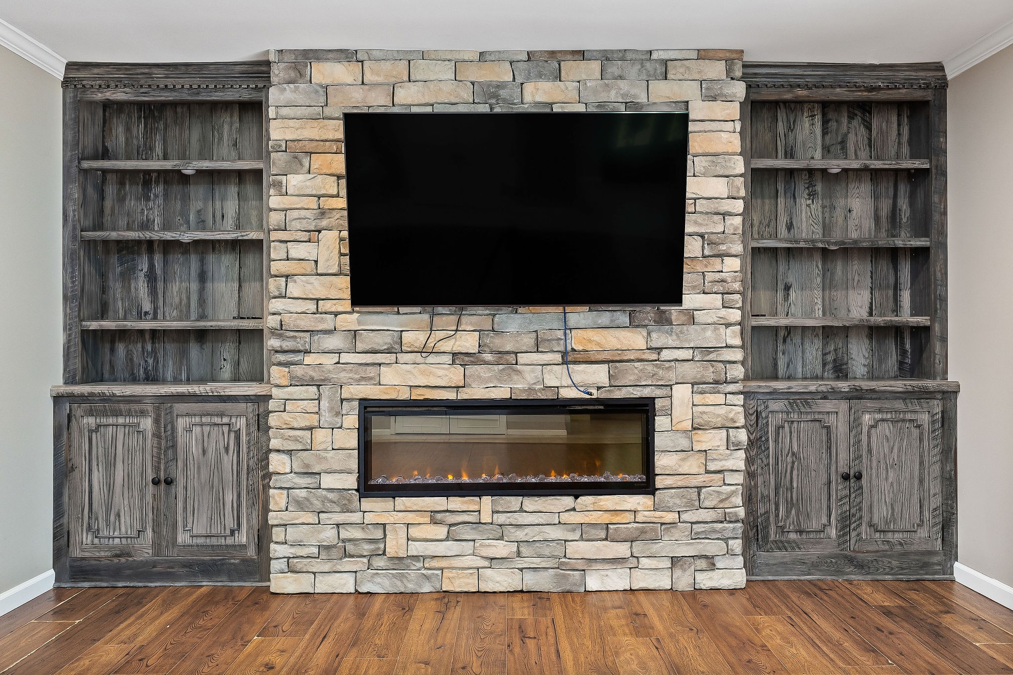 727 Timber Lane Cookeville, TN 38501 - Photo 27 of 68 a living room with a fireplace and a flat screen tv