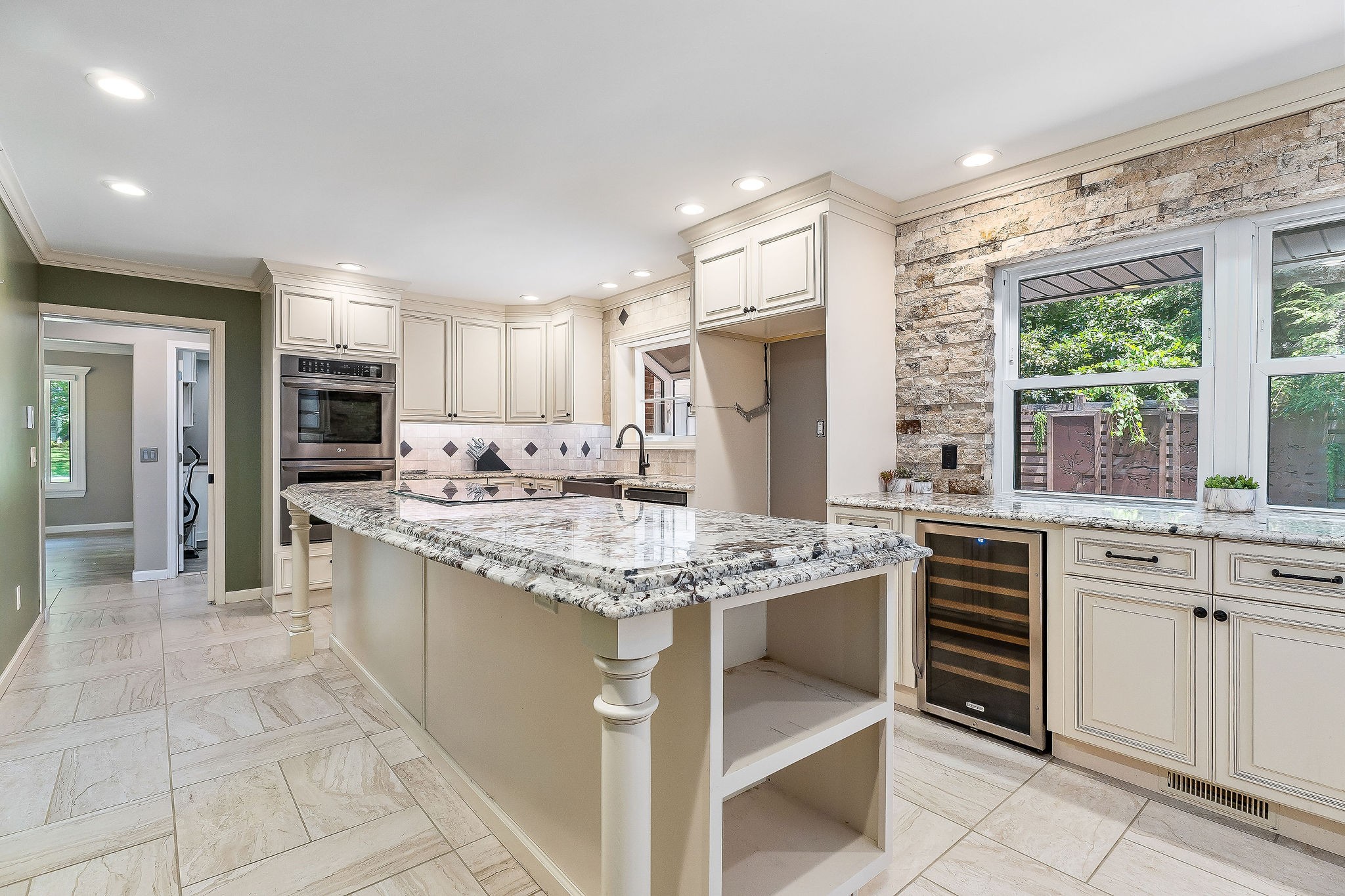 727 Timber Lane Cookeville, TN 38501 - Photo 34 of 68 a kitchen with stainless steel appliances granite countertop a stove top oven a sink dishwasher and a refrigerator