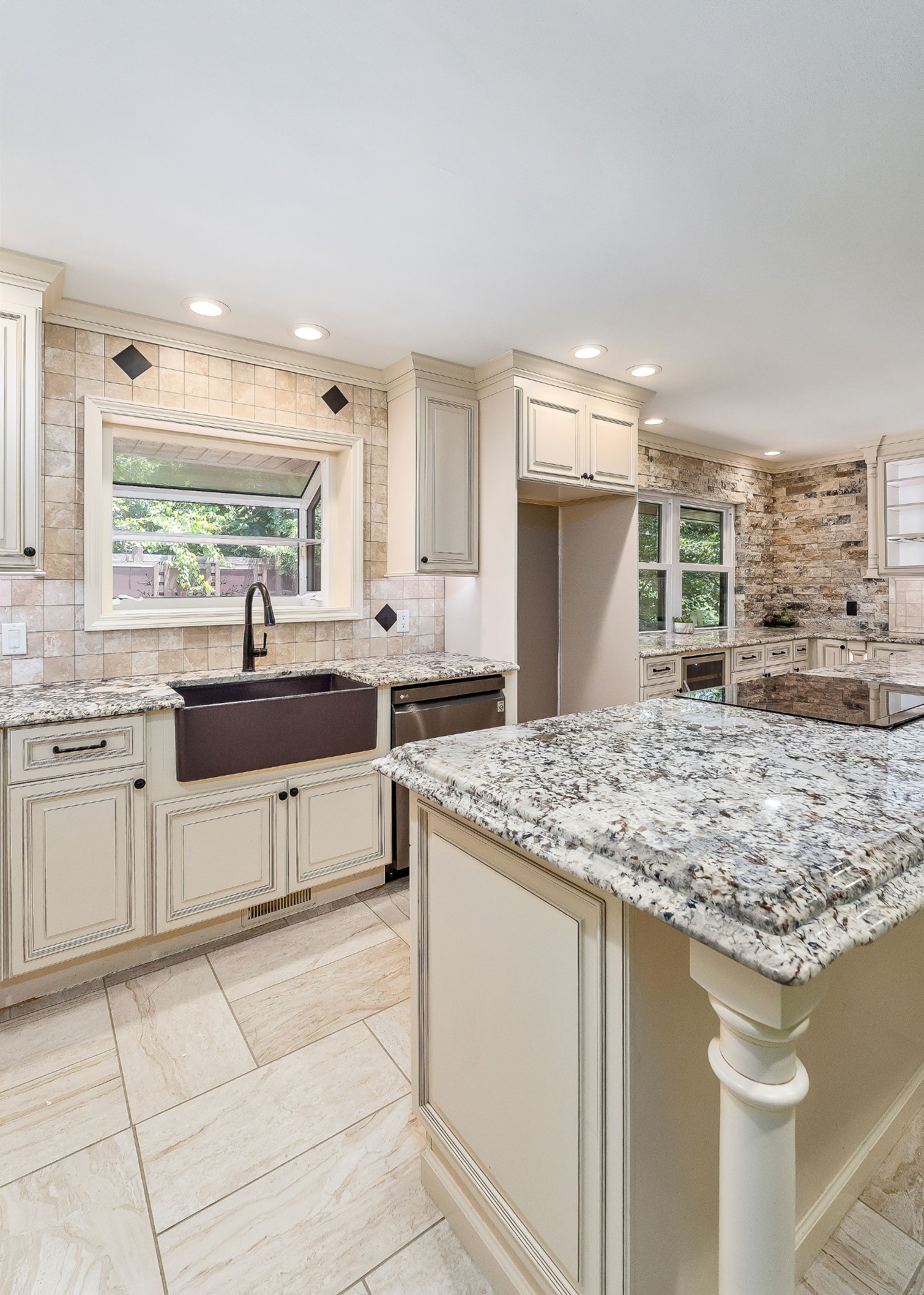 727 Timber Lane Cookeville, TN 38501 - Photo 37 of 68 a kitchen with stainless steel appliances granite countertop a sink stove and cabinets