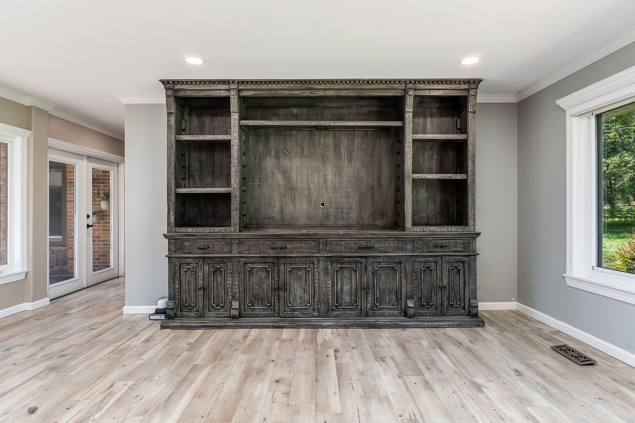 727 Timber Lane Cookeville, TN 38501 - Photo 6 of 68 an empty room with wooden floor and windows