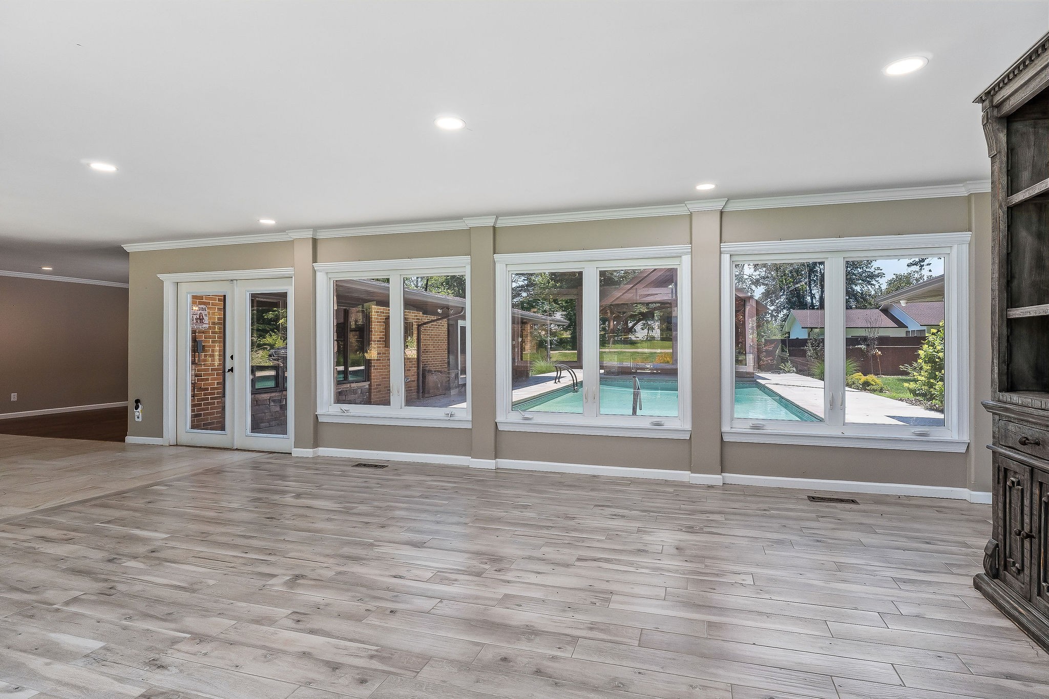 727 Timber Lane Cookeville, TN 38501 - Photo 7 of 68 a view of an empty room with wooden floor and a window