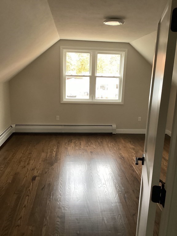 1 Droy Circle Easthampton, MA 01027 - Photo 15 of 20 an empty room with wooden floor and windows
