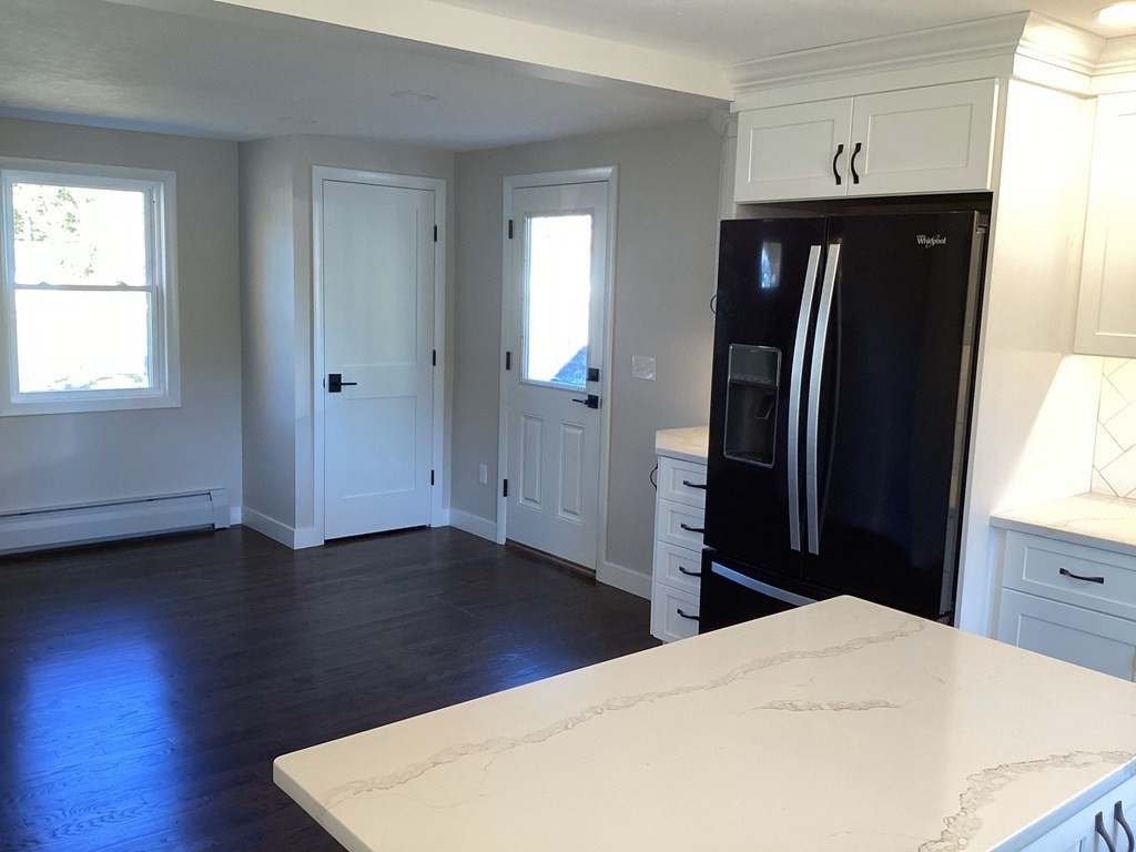 1 Droy Circle Easthampton, MA 01027 - Photo 6 of 20 a bedroom with a bed and wooden floor