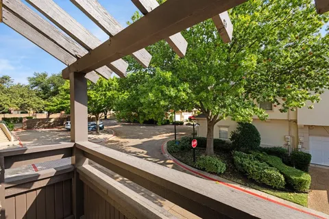 a view of a street with sitting area