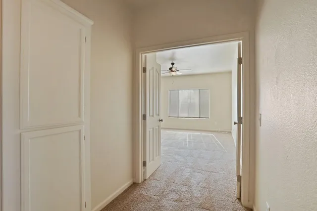 a white bath tub sitting next to a white sink