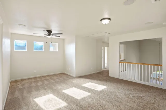 a bathroom with a double vanity sink toilet mirror and bathtub
