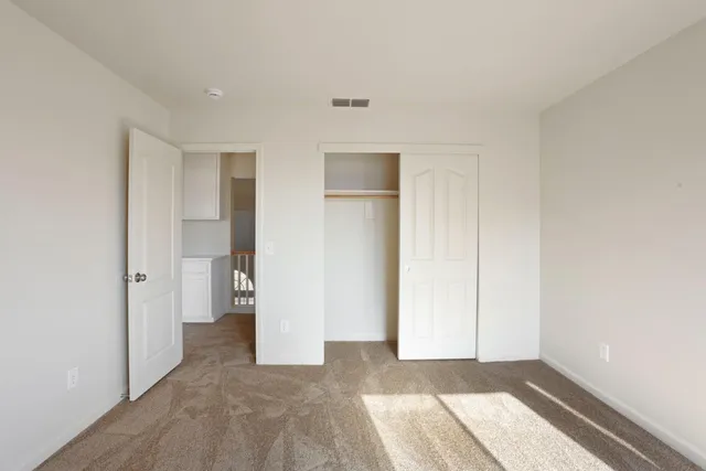 a view of backyard of the house