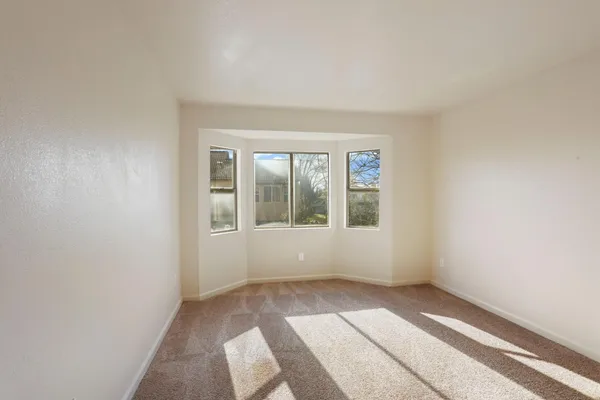 a view of a backyard of the house