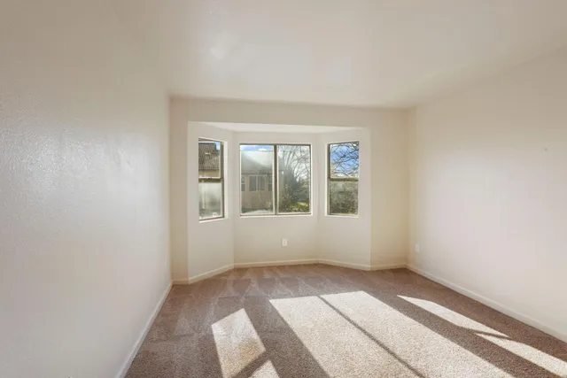 a view of a backyard of the house