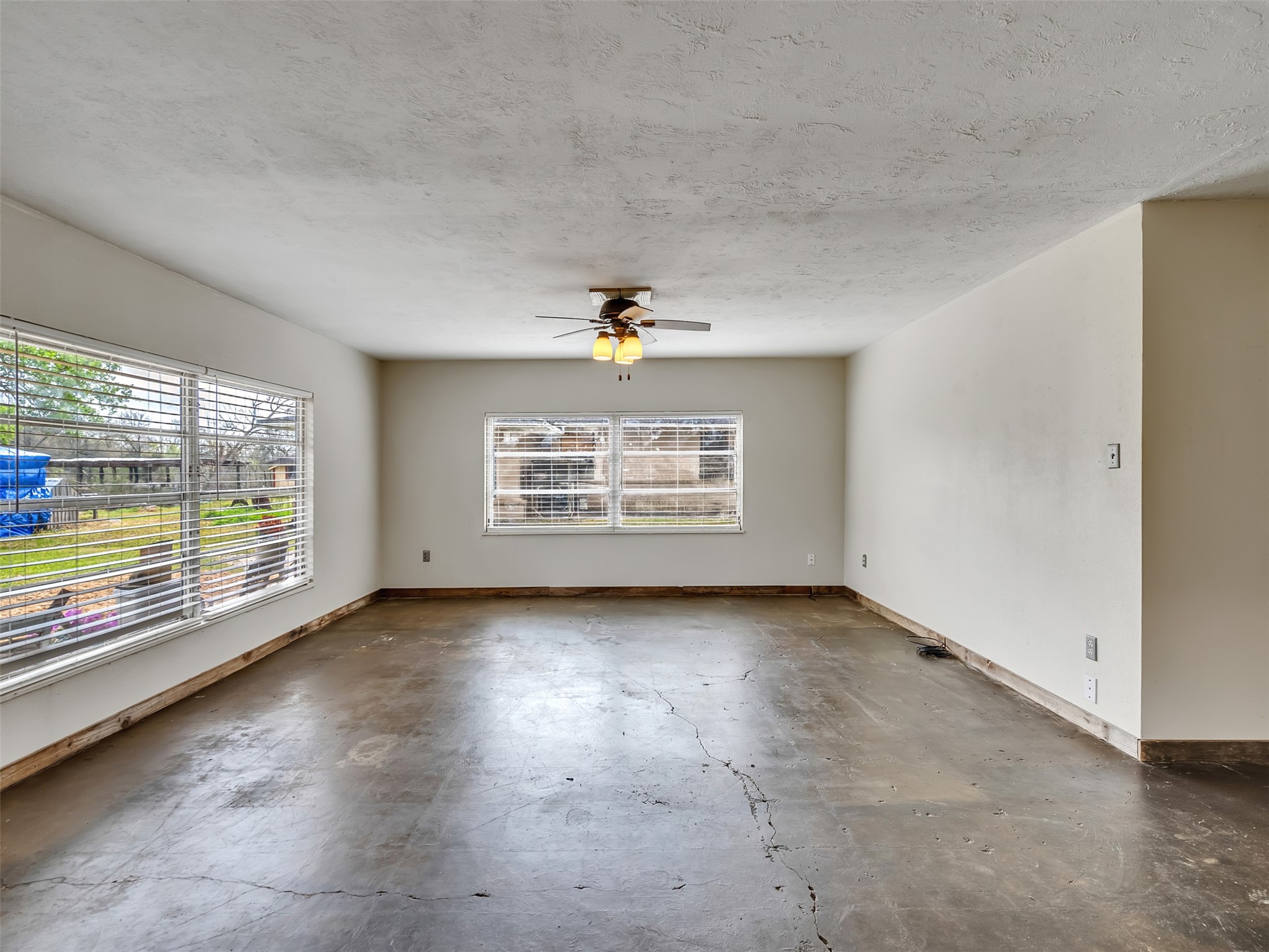 3315 St Anne Street Liverpool, TX 77577 - Photo 36 of 48 an empty room with windows and mountain view