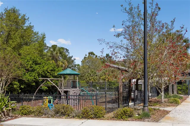 a view of house with a yard