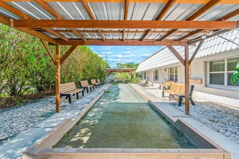 a view of an outdoor space and tennis court
